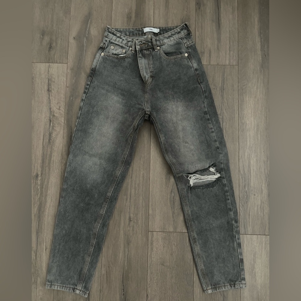 “Washed out” women’s black jeans